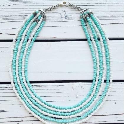 Turquoise And White Beads Multi Strand Layering..