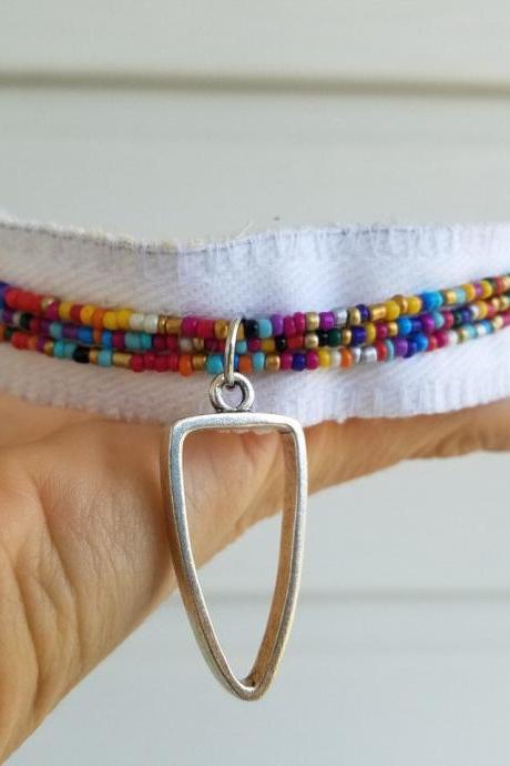 Rainbow Bead Choker with Arrowhead on White Denim Necklace.